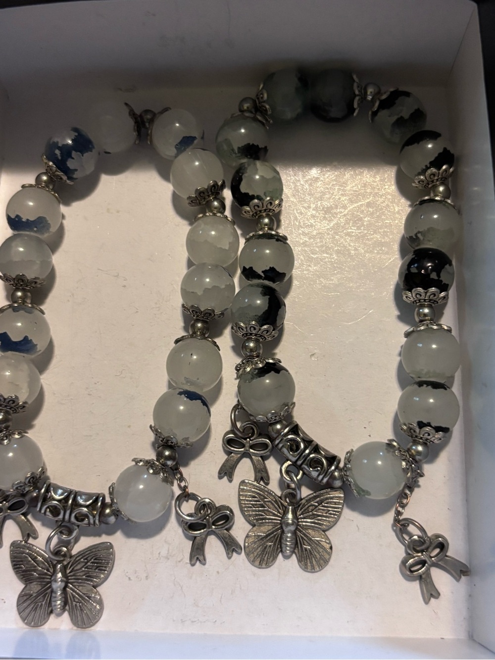 Handmade White & Black Beaded Bracelet with Butterfly Charm